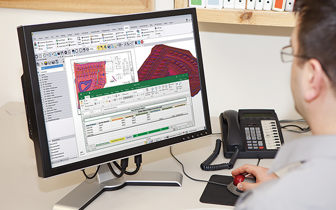 Sitech Louisiana Software Solutions on a computer at a desk.