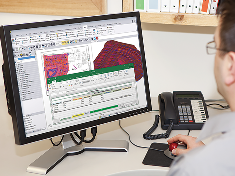 Sitech Louisiana Software Solutions on a computer at a desk.