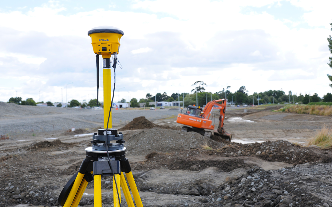 Trimble SPS986 GNSS Smart Antenna set up on a construction site. Site Positioning Software: Top Features to Look for